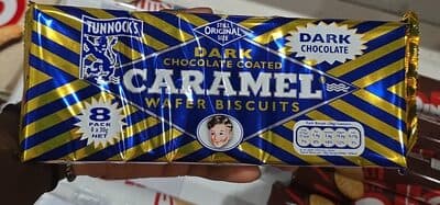 Dark chocolate coated caramel wafer biscuits
